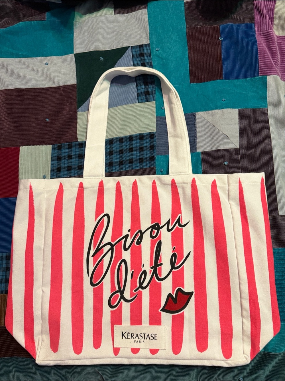 Kerastase White Canvas Tote with Pink Stripes and Lip Graphic